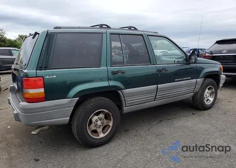 1997 Jeep Grand Cherokee Laredo from USA, damaged, VIN 1J4GZ58S5VC772355